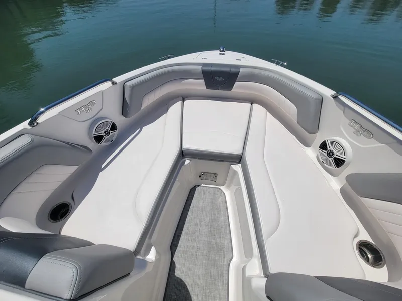 Slide: The Image of Interior of a 2016 Chaparral 21 H2O Sport boat on calm water. - 4