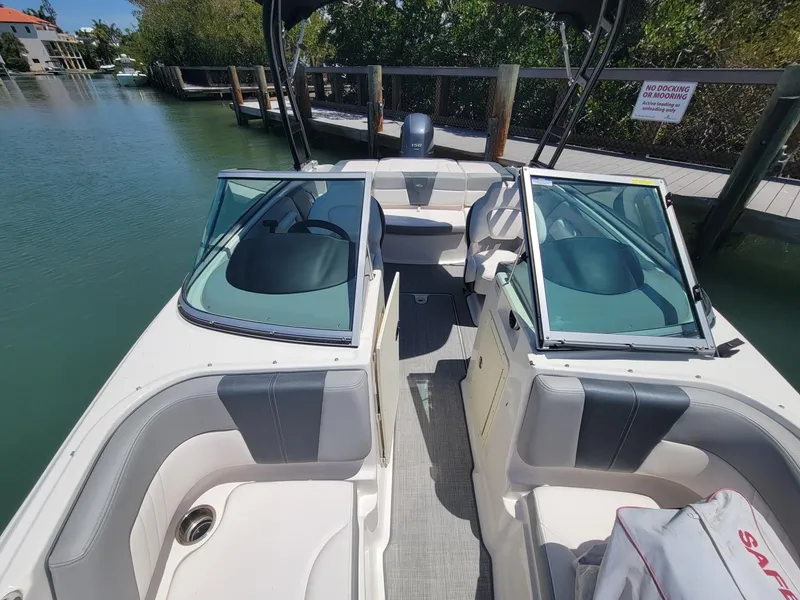 Slide: The Image of Interior view of a 2016 Chaparral 21 H2O Sport boat at dock. - 5