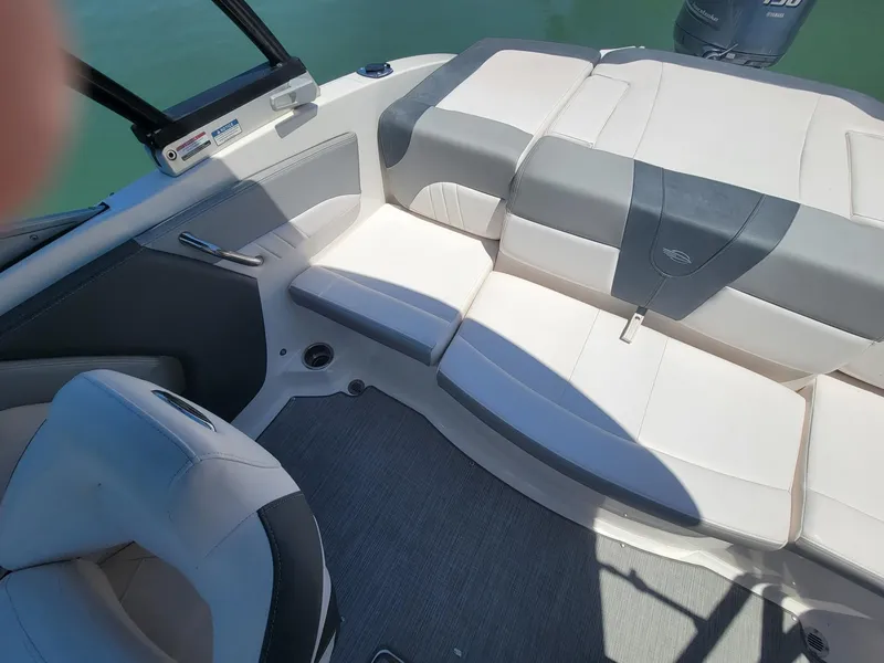 Slide: The Image of Interior of 2016 Chaparral 21 H2O Sport with white seating. - 6