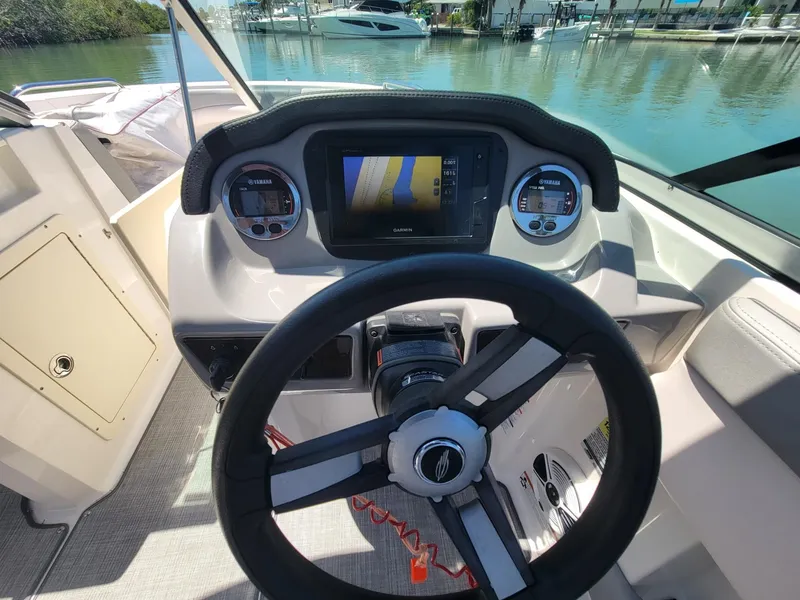 Slide: The Image of Dashboard of a 2016 Chaparral 21 H2O Sport boat. - 8
