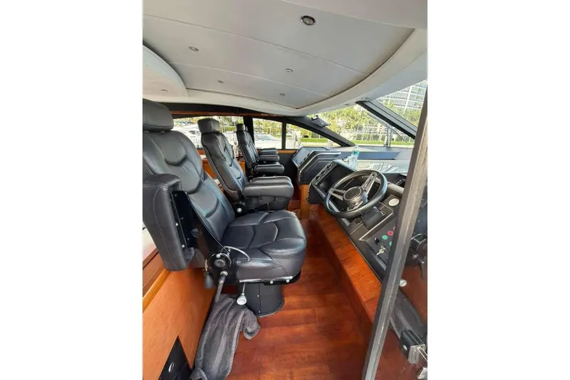 Slide: The Image of Luxurious interior of 2005 Viking Princess V70 Express yacht with leather seating. - 15