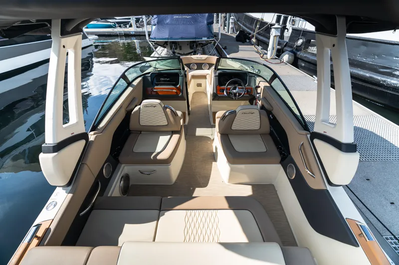 Slide: The Image of 2025 Chris-Craft Sportster 25 boat interior with luxurious seating and modern design. - 7