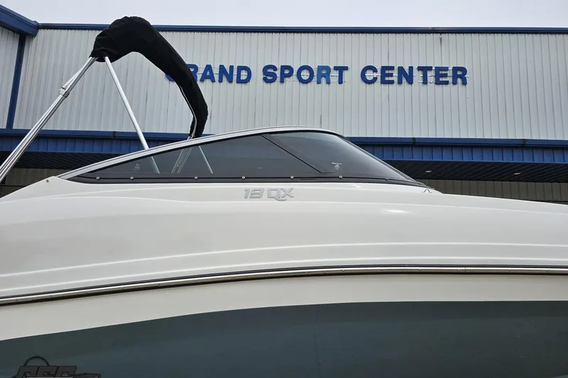 Slide: The Image of 2020 Rinker 19QX BR boat at Grand Sport Center, side view. - 16