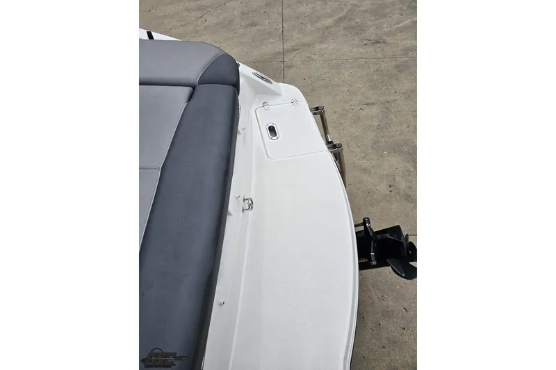 Slide: The Image of 2020 Rinker 19QX BR boat stern with gray seating and swim platform. - 45