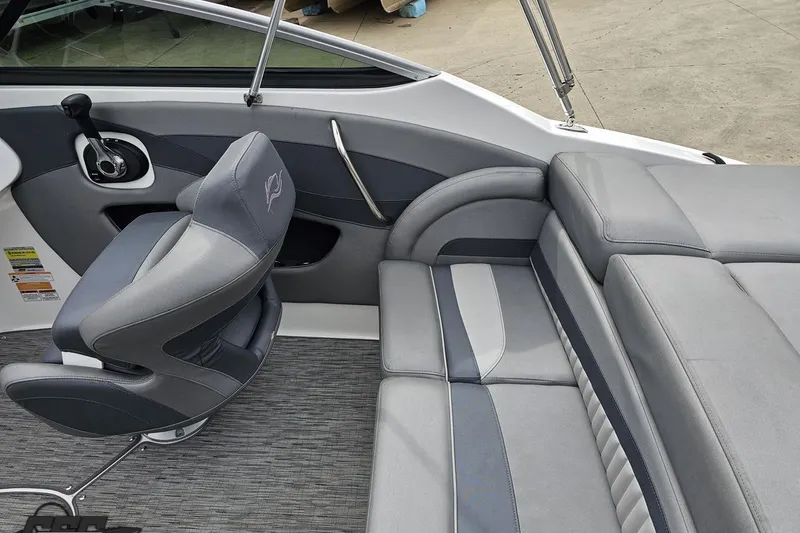 Slide: The Image of Interior of a 2020 Rinker 19QX BR boat featuring gray seating and modern design. - 54
