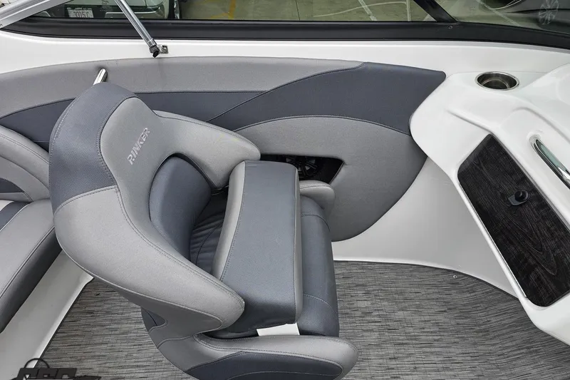 Slide: The Image of Interior of a 2020 Rinker 19QX BR boat with gray seating and modern design. - 60
