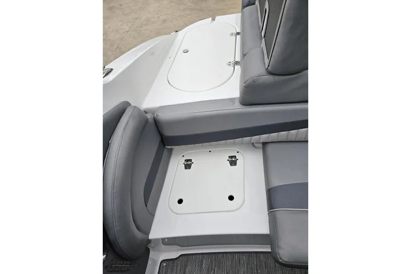 Slide: The Image of 2020 Rinker 19QX BR boat interior seating and storage compartments. - 88