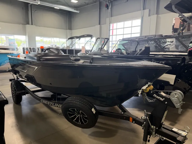 The Image of 2026 Crestliner 1650 Kodiak SC boat in showroom. - 1