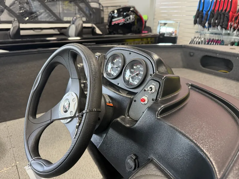 Slide: The Image of Steering wheel and dashboard of Crestliner 1650 Kodiak SC 2026. - 6