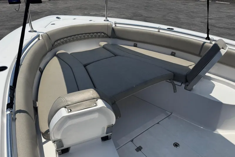 Slide: The Image of 2021 Sportsman Open 282 Center Console boat with spacious seating and sunbed. - 10