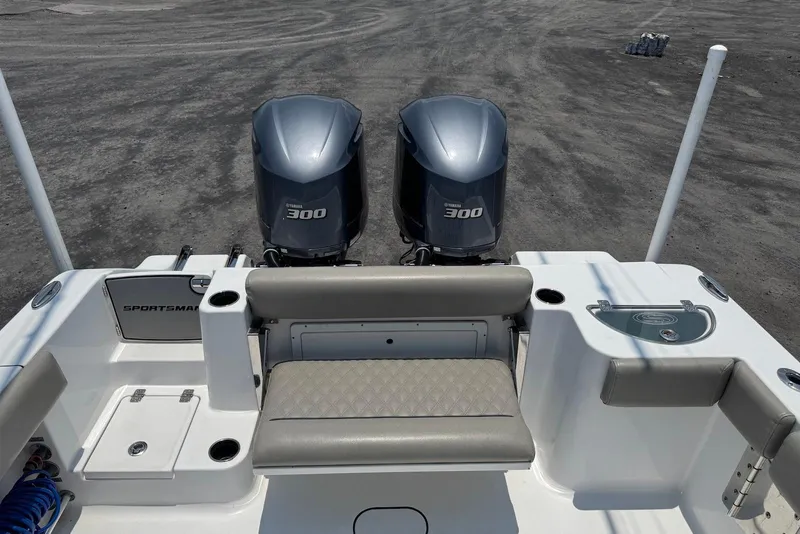 Slide: The Image of 2021 Sportsman Open 282 Center Console with dual Yamaha 300 engines, rear seating view. - 16