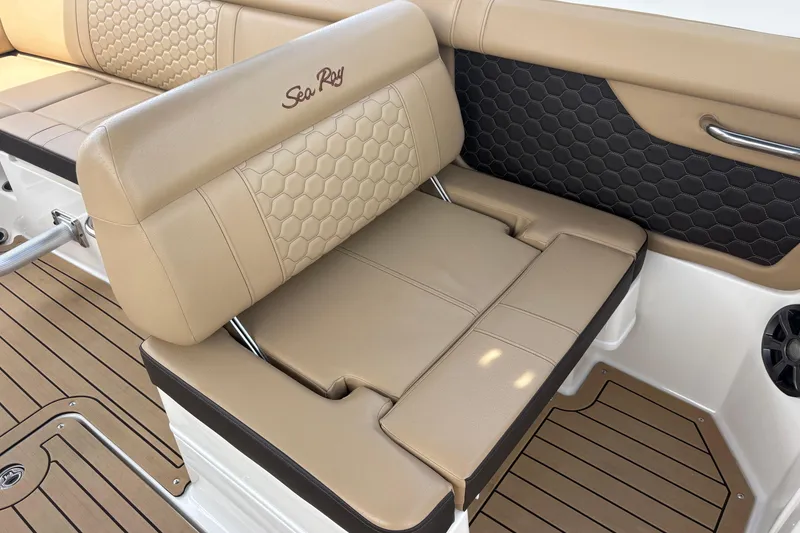 Slide: The Image of 2021 Sea Ray SDX 270 boat interior with tan seating on open water. - 6