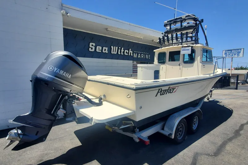 Slide: The Image of 2011 Parker 2320 SL Sport Cabin boat with Yamaha engine at Sea Witch Marine. - 2