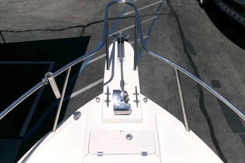Slide: The Image of Bow view of 2011 Parker 2320 SL Sport Cabin boat with anchor and chain. - 4