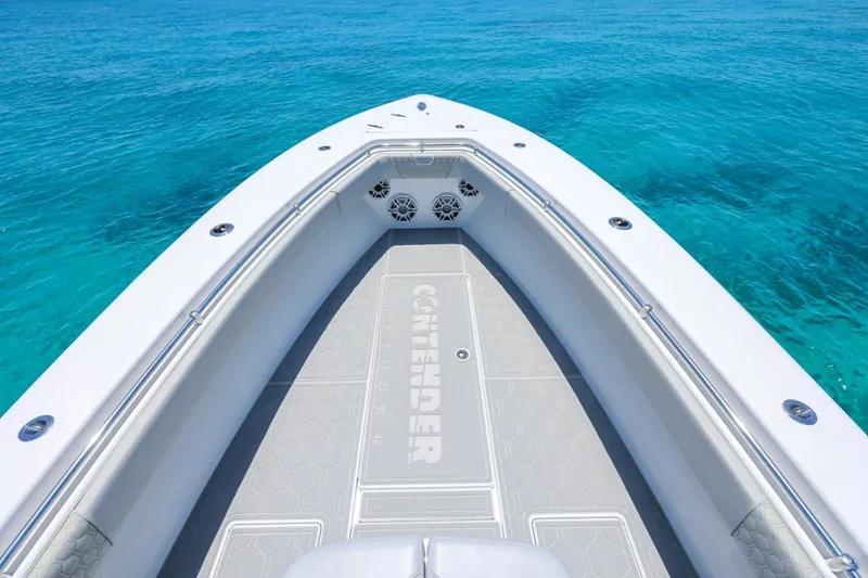 Slide: The Image of 2023 Contender 35 ST boat deck with ocean view, showcasing sleek design and spacious layout. - 11