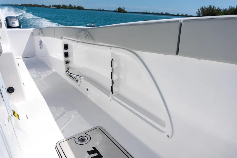 Slide: The Image of 2026 Twin Vee 340 GFX CC boat interior, showcasing sleek design and spacious deck. - 10