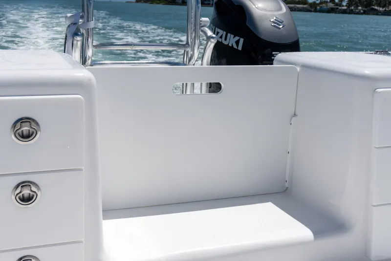 Slide: The Image of 2026 Twin Vee 340 GFX CC boat with Suzuki engine, featuring sleek white deck design. - 17