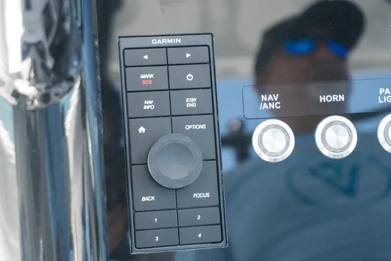 Slide: The Image of Garmin control panel on 2026 Twin Vee 340 GFX CC boat dashboard. - 8