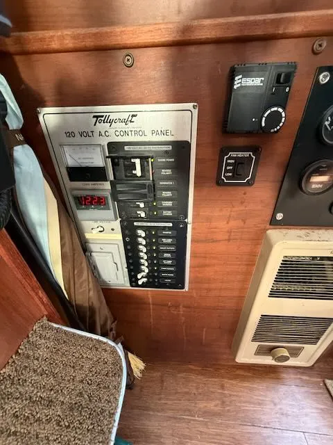 Slide: The Image of Tollycraft 34 1980 control panel with 120 volt AC display. - 12