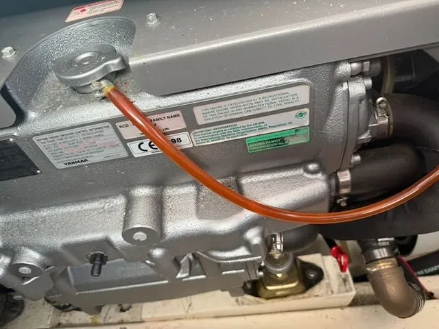 Slide: The Image of Close-up of a 1980 Tollycraft 34 boat engine. - 15