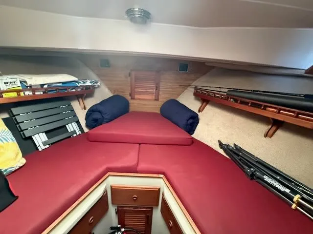 Slide: The Image of Interior of a 1980 Tollycraft 34 with red cushions. - 18