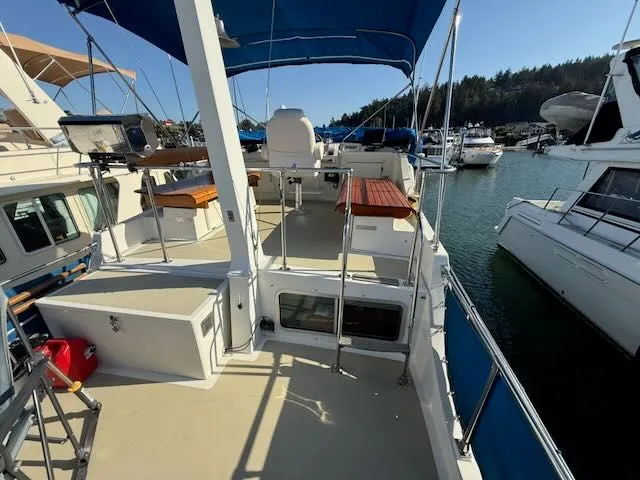 Slide: The Image of 1980 Tollycraft 34 yacht docked in marina, sunny day. - 26