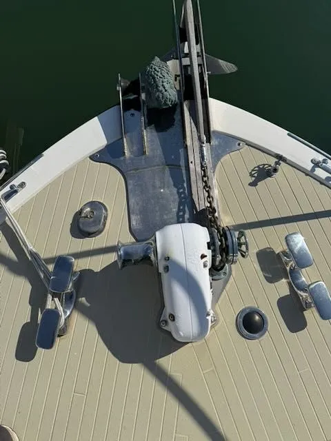 Slide: The Image of Bow of a 1980 Tollycraft 34 boat with anchor windlass. - 36