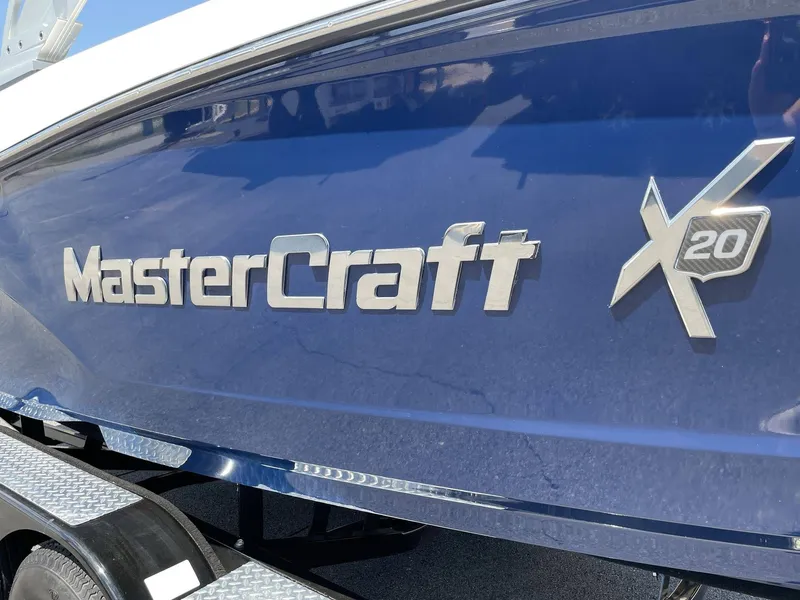 Slide: The Image of 2016 MasterCraft X20 boat in blue with logo. - 16