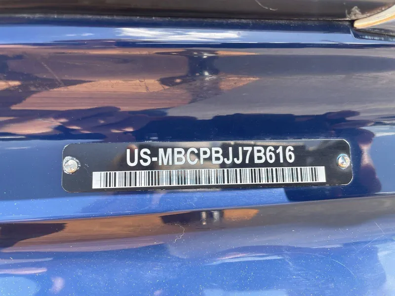 Slide: The Image of 2016 MasterCraft X20 serial number on blue background. - 24