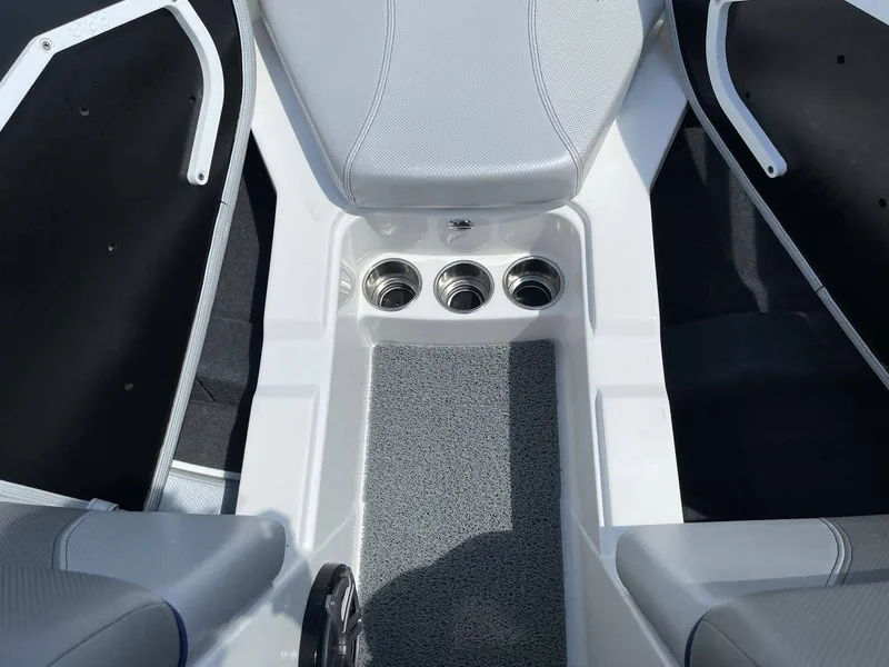 Slide: The Image of Interior of a 2016 MasterCraft X20 boat with seating area. - 26