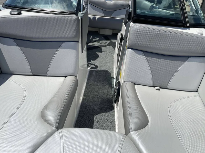 Slide: The Image of Interior of a 2016 MasterCraft X20 boat with gray seating. - 29