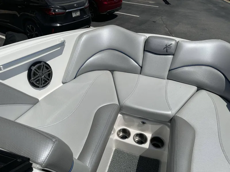 Slide: The Image of Interior of a 2016 MasterCraft X20 boat with gray upholstery. - 32
