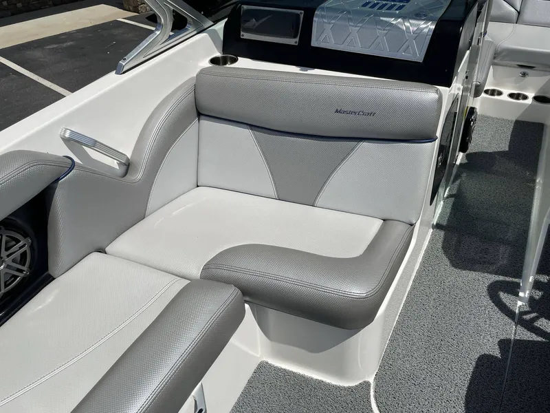 Slide: The Image of Interior of a 2016 MasterCraft X20 boat with gray upholstery. - 33