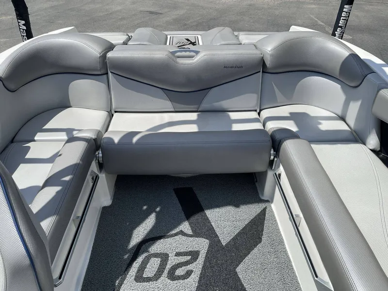 Slide: The Image of Interior of a 2016 MasterCraft X20 boat with gray seating. - 35