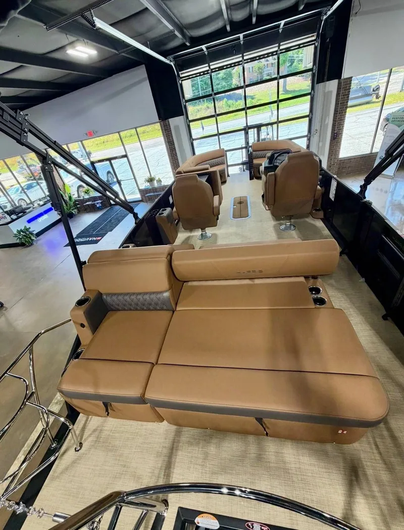 Slide: The Image of Interior view of the 2026 Harris Cruiser 230 pontoon boat. - 11