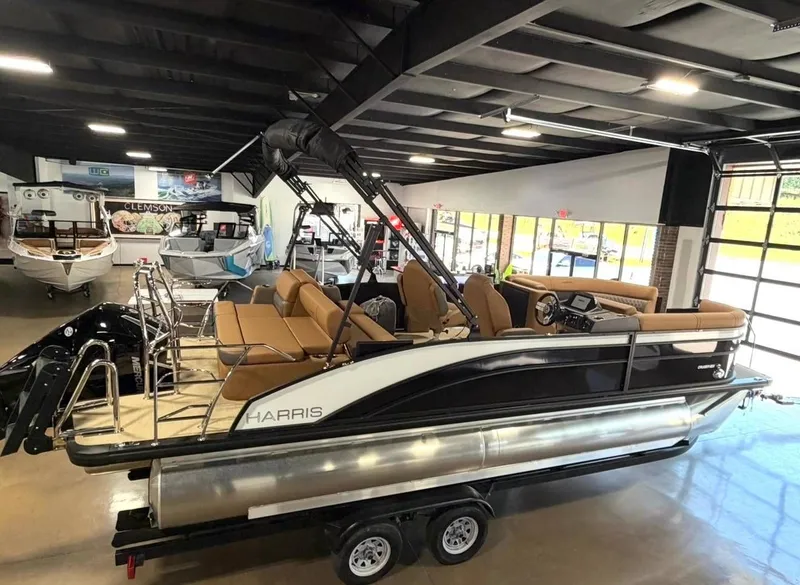 Slide: The Image of Harris Cruiser 230 pontoon boat 2026 in showroom. - 5