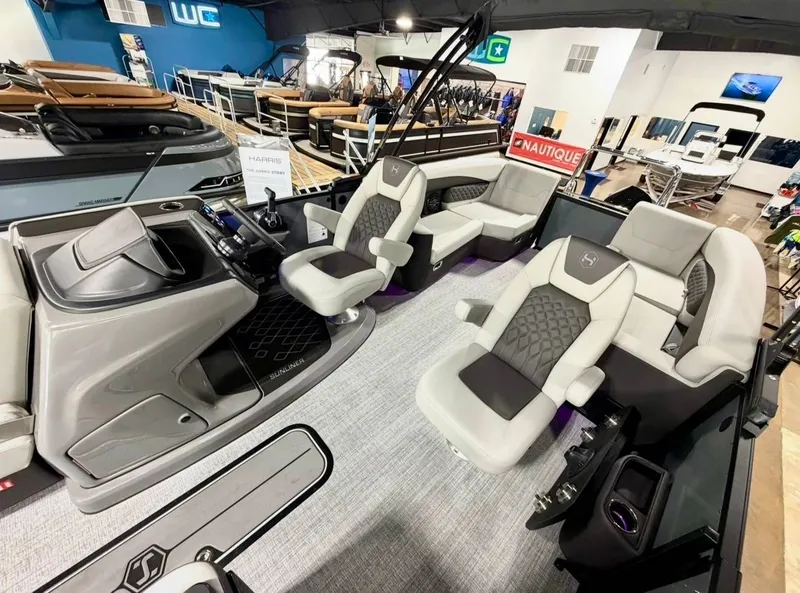 Slide: The Image of Interior of Harris Sunliner 230 pontoon boat, 2026 model, featuring luxurious seating. - 10