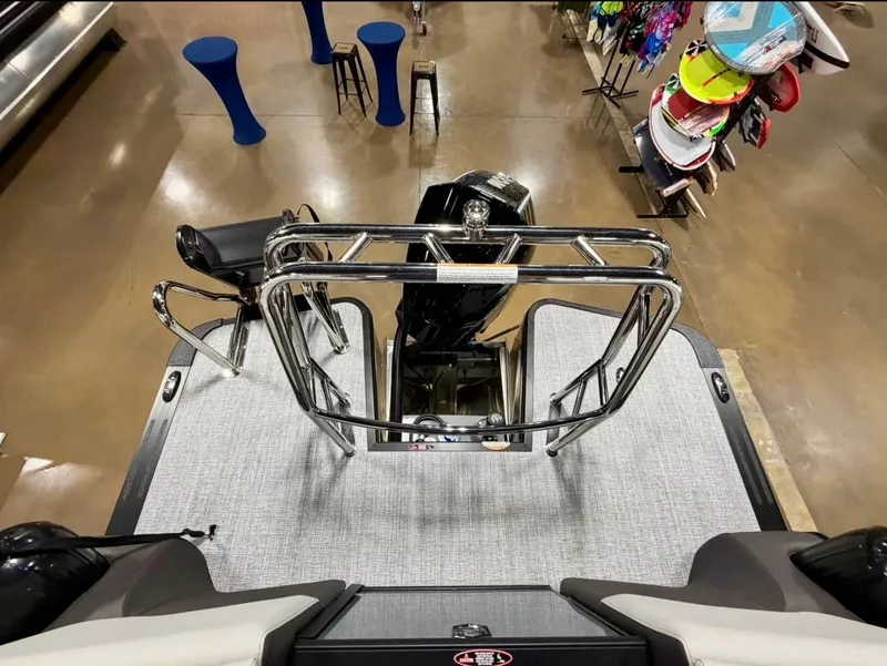 Slide: The Image of Harris Sunliner 230 2026 boat rear with motor and accessories. - 16