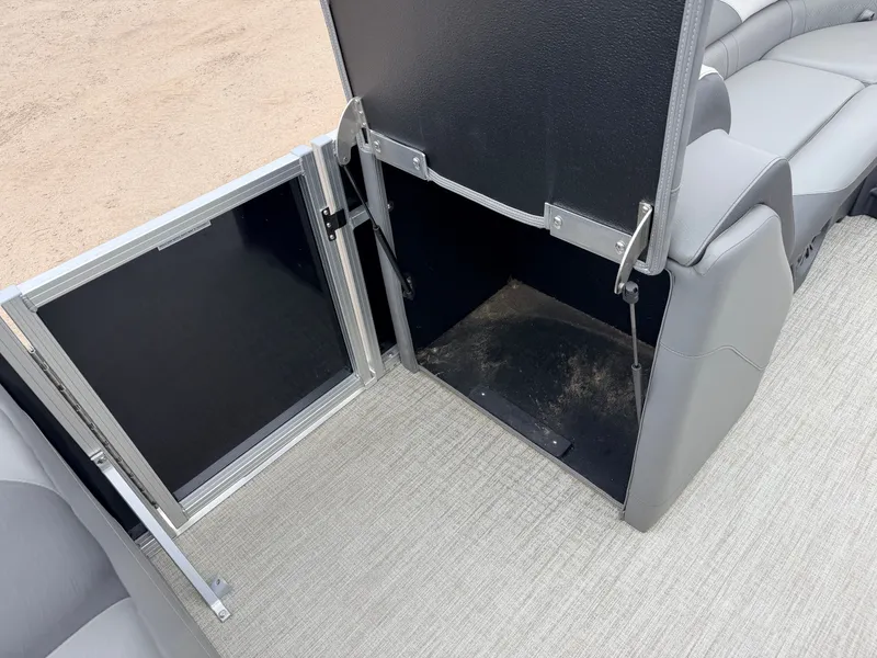 Slide: The Image of 2023 Tahoe LTZ 2385 Elite seating with storage compartment. - 16