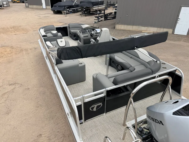 Slide: The Image of 2023 Tahoe LTZ 2385 Elite pontoon boat with Honda 140HP engine. - 7