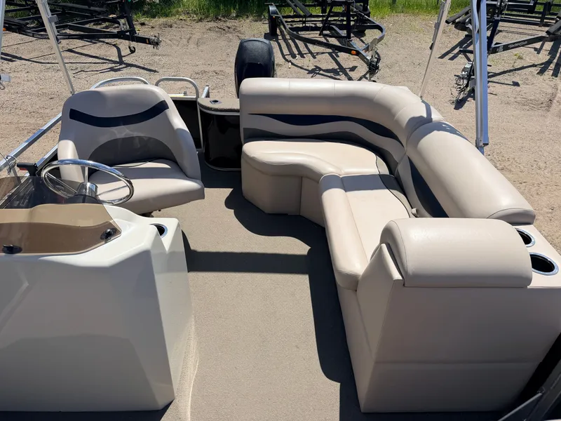 Slide: The Image of Interior of 2013 Qwest 7516 Adventure pontoon boat with beige seating. - 5