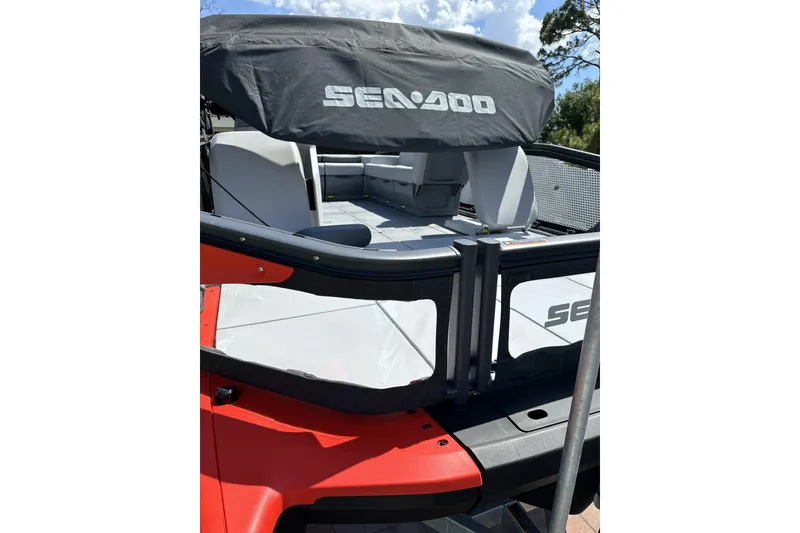 Slide: The Image of 2024 Sea-Doo Switch Cruise 18 with canopy, showcasing spacious seating and modern design. - 8