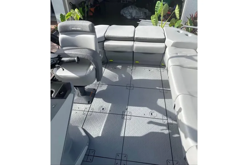 Slide: The Image of 2024 Sea-Doo Switch Cruise 18 interior with modular seating and spacious deck layout. - 9