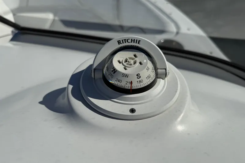 Slide: The Image of Ritchie compass on 2017 Sea Hunt Escape 211 LE boat dashboard. - 22