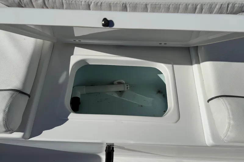 Slide: The Image of Open storage compartment on 2017 Sea Hunt Escape 211 LE boat. - 28