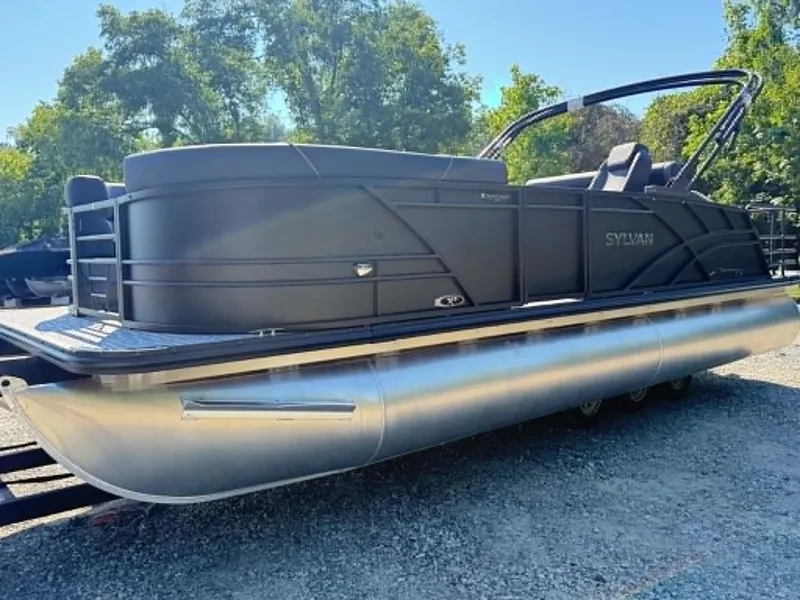 The Image of 2026 Sylvan X3 CLZ DH pontoon boat parked outdoors. - 1