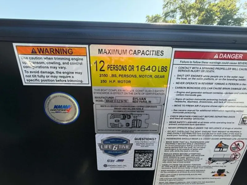Slide: The Image of Warning labels and capacities for Sylvan X3 CLZ DH 2026 boat. - 14
