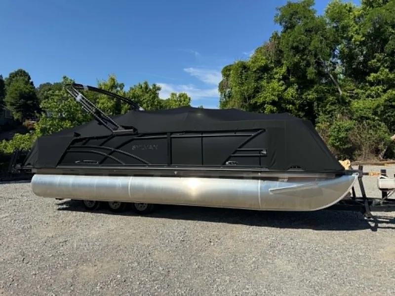 Slide: The Image of 2026 Sylvan X3 CLZ DH pontoon boat covered outdoors. - 5