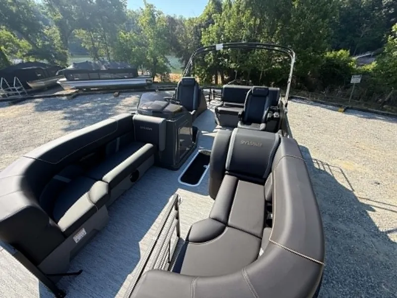 Slide: The Image of 2026 Sylvan X3 CLZ DH pontoon boat with luxurious seating area. - 6