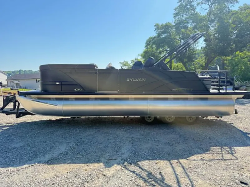 Slide: The Image of 2026 Sylvan X3 CLZ DH pontoon boat on trailer outdoors. - 7